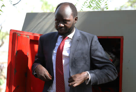 Peter Biar Ajak, the South Sudan country director for the London School of Economics' International Growth Centre based in Britain, arrives at the courtroom in Juba, South Sudan March 21, 2019. REUTERS/Stringer