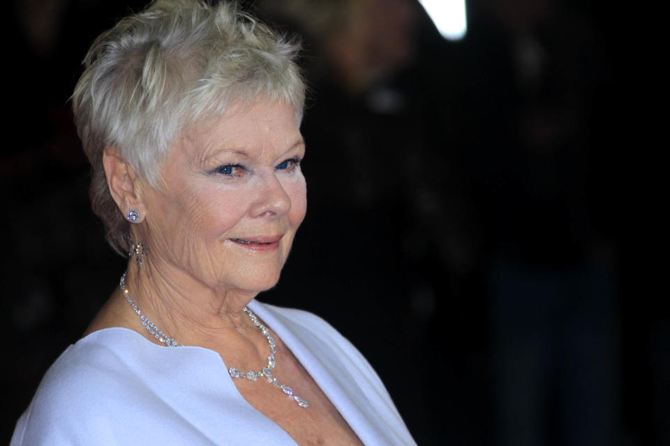 Judi Dench arrives at the world premiere of "Skyfall" at the Royal Albert Hall on Tuesday, Oct. 23, 2012 in London. (Photo by Joel Ryan/Invision/AP)