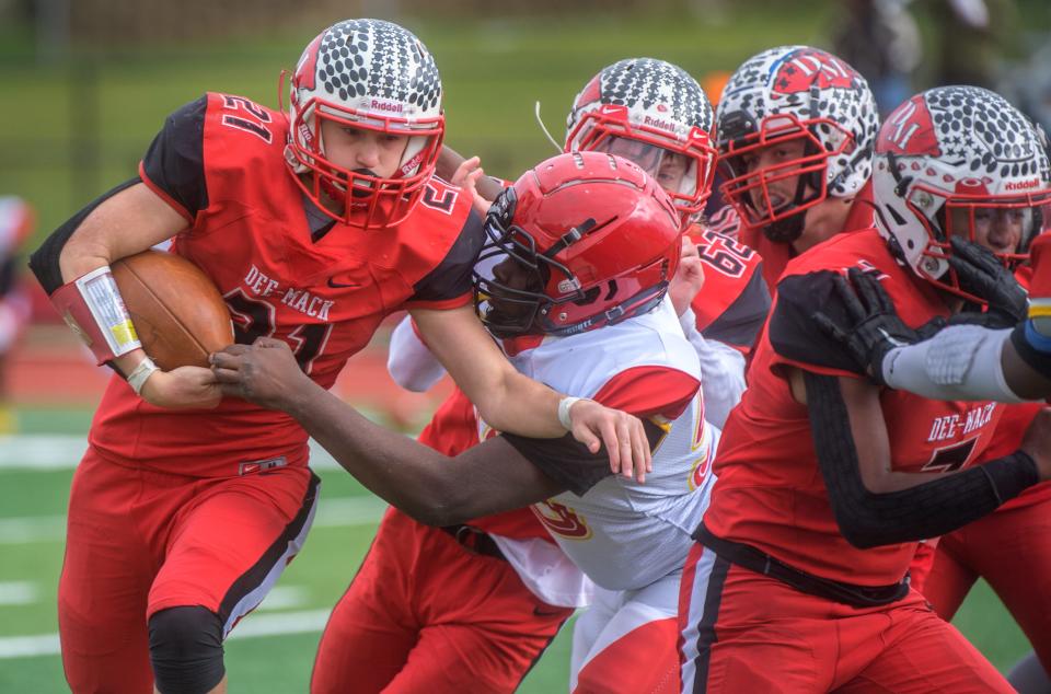 Dee-Mack running back Brent Denniston tries to move the ball against Chicago North Lawndale in the first half of their Class 2A football first-round playoff game Saturday, Oct. 30, 2021 in Mackinaw. The Chiefs advanced with a 40-14 victory.