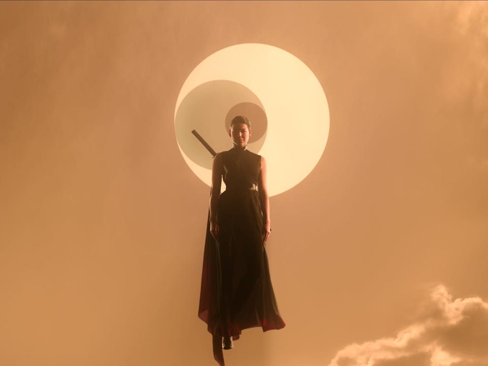 sea shimooka as sophon in three body problem, a woman in black robes and with a sword strapped to her back levitating in front of a logo of three concentric circles, shrouded in clouds