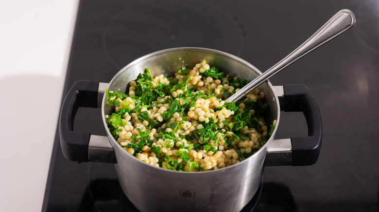 Coucous and kale in pot 