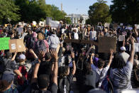 Demonstrators gather to protest the death of George Floyd, Monday, June 1, 2020, near the White House in Washington. Floyd died after being restrained by Minneapolis police officers. (AP Photo/Evan Vucci)