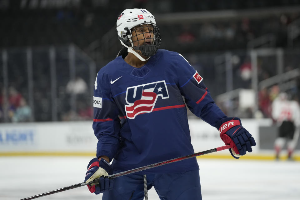 United States forward Laila Edwards (14) stands on the ice during the second period of a rivalry series women's hockey game against Canada Saturday, Nov. 11, 2023, in Los Angeles. (AP Photo/Ashley Landis)