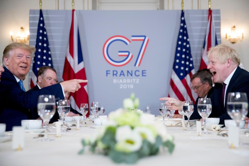 President Donald Trump and Britain's Prime Minister Boris Johnson attend a working breakfast at the Hotel du Palais on the sidelines of the G-7 summit in Biarritz, France.