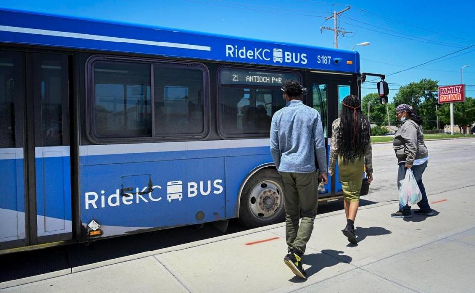 Lekatta English, right, and her children, Maraih Brand, center, and Malachi Brand, left, boarded a KCATA RideKC Bus, on Thursday, June 2, 2022, outside the Transit Center, 7501 Prospect Ave., in Kansas City. After the bus fares were eliminated, English said there are not as many bus routes on Sundays, which has made it more difficult to get around the city.