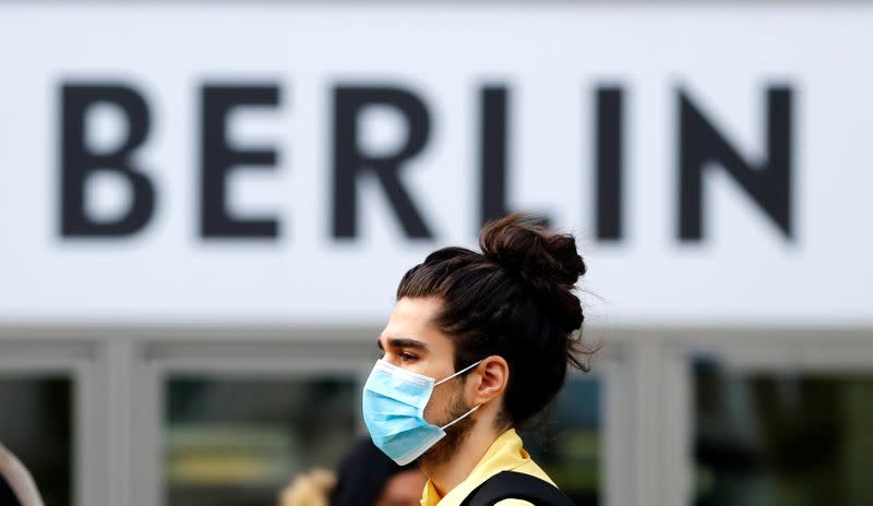 A man wearing a face mask is pictured at Schloss Strasse shopping street as the coronavirus disease (COVID-19) outbreak continues in Berlin