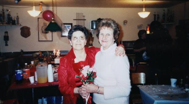 Ryczak, left, and Wallace were so close that Wallace invited Ryczak to her daughter's wedding. The two are shown at the reception. 