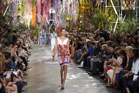 A model presents a creation by Belgian designer Raf Simons as part of his Spring/Summer 2014 women's ready-to-wear fashion show for French fashion house Christian Dior during Paris fashion week September 27, 2013. REUTERS/Benoit Tessier