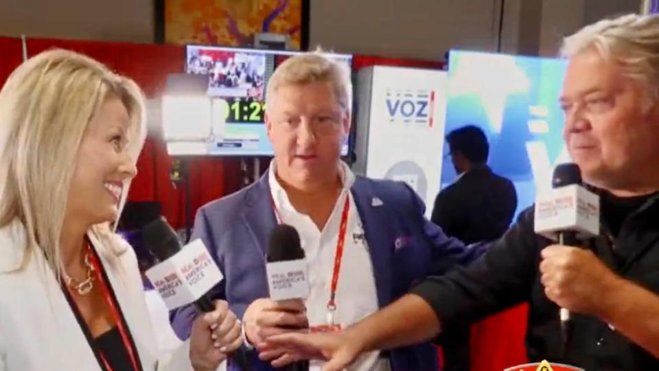 Patriot Mobile Action PAC leader Leigh Wambsganss, left, and Patriot Mobile executive Glenn Story, center, were podcast guests of former Donald Trump advisor Steve Bannon at CPAC in Dallas. Via @cjtackett on Twitter from Real America's Voice