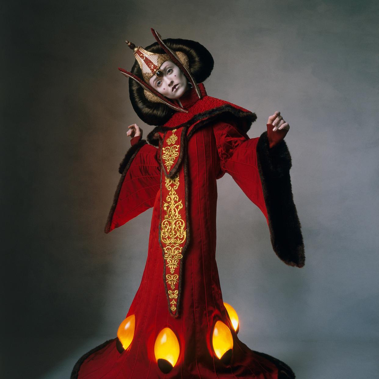 THE FORCE IS WITH HER: Audrey Marnay wears Queen Amidala’s Throne Room Costume, created for Natalie Portman, who plays the royal mother of Luke Skywalker. The embroidered corded-silk and faux-fur robe, with a row of electric lights at the hem, suggests a Chinese Imperial gown. Costume by Trisha Biggar.