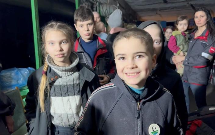 Children react as they take shelter, amid Russia&#39;s invasion of Ukraine, in a bunker said by Ukraine&#39;s Azov Battalion to be in Azovstal steelworks in Mariupol, Ukraine&#xa0; - AZOV BATTALION/REUTERS