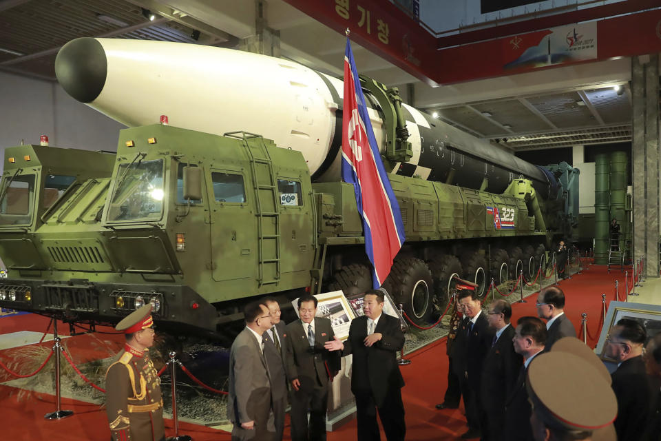 FILE - In this photo provided by the North Korean government, North Korean leader Kim Jong Un, center, speaks in front of what the North says an intercontinental ballistic missile displayed at an exhibition of weapons systems in Pyongyang, North Korea, on Oct. 11, 2021. North Korea test-launched a suspected intercontinental ballistic missile and two shorter-range weapons into the sea Wednesday, May 25, 2022, South Korea said, hours after President Joe Biden ended a trip to Asia where he reaffirmed the U.S. commitment to defend its allies in the face of the North’s nuclear threat. Independent journalists were not given access to cover the event depicted in this image distributed by the North Korean government. The content of this image is as provided and cannot be independently verified. (Korean Central News Agency/Korea News Service via AP, File)