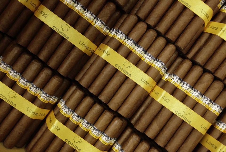 Cohiba cigars that are ready to be put in boxes are pictured at the H. Upmann factory in Havana in this March 1, 2013 file photo. The European Union decided last week to seek negotiations with Havana on increasing trade, investment and dialogue. This will mark their closest contacts after years of tension about Cuba's human rights record, over which the EU imposed its own sanctions until 2008. To match Insight EU-CUBA/ REUTERS/Desmond Boylan/Files (CUBA - Tags: SOCIETY BUSINESS)