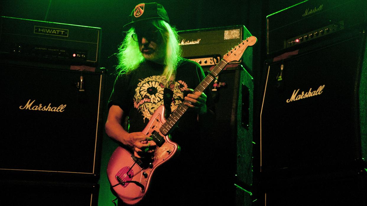  J Mascis onstage in Germany with Dinosaur Jr, 2022. 