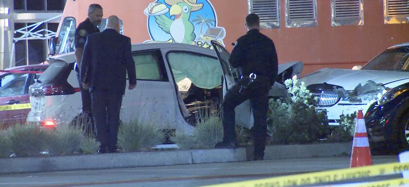 A woman was killed tonight and at least one person was in critical condition after they were struck by a vehicle driven by a man in the Pike retail-entertainment area of downtown Long Beach. The vehicle struck multiple vehicles and pedestrians in a crosswalk at the intersection of Shoreline Drive and Aquarium Way at 6:34 p.m. Saturday