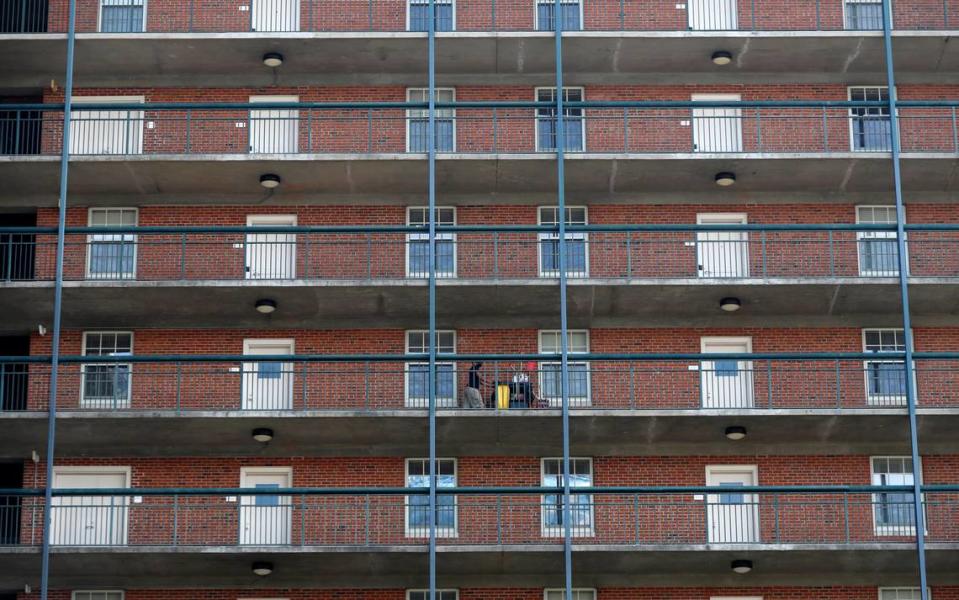 A housekeeper works at UNC’s Hinton James residence hall in Chapel Hill, N.C., Tuesday, August 18, 2020.