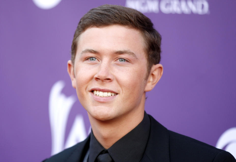 Scotty McCreery arrives at the 47th Annual Academy of Country Music Awards on Sunday, April 1, 2012 in Las Vegas. (AP Photo/Isaac Brekken)