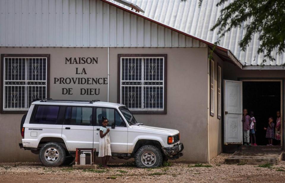 Children stand in the courtyard of the Maison La Providence de Dieu orphanage it Ganthier, Croix-des-Bouquets, Haiti, Sunday, Oct. 17, 2021, where a gang abducted 17 missionaries from a U.S.-based organization. The 400 Mawozo gang, notorious for brazen kidnappings and killings took the group of 16 U.S. citizens and one Canadian, after a trip to visit the orphanage.