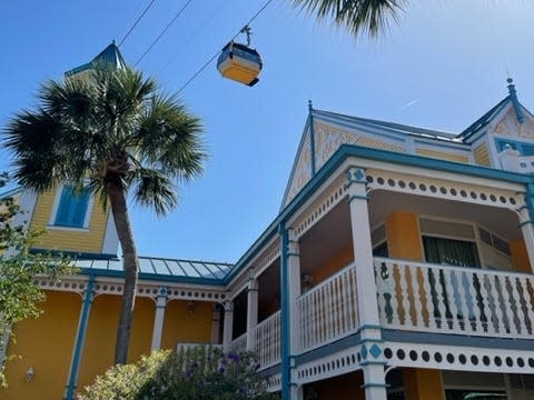 the skyliner flying over the caribbean beach resort at disney world