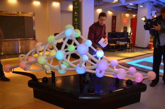 Each colorful sphere makes music at this exhibit in the National Museum of Mathematics (MoMath).