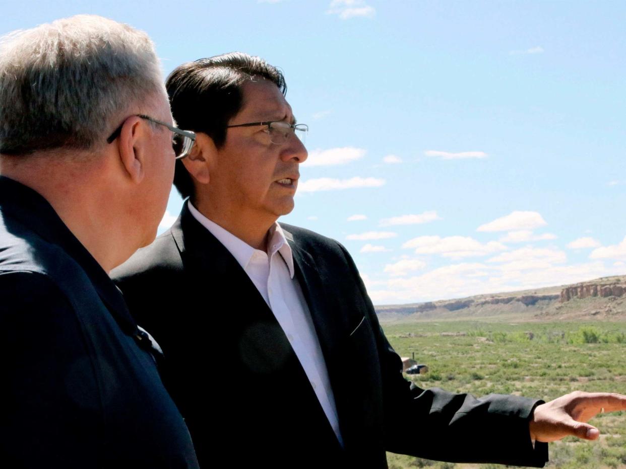 Navajo Nation President Jonathan Nez, right, had called on U.S. Interior Secretary David Bernhardt, left, to close the Grand Canyon park: AP