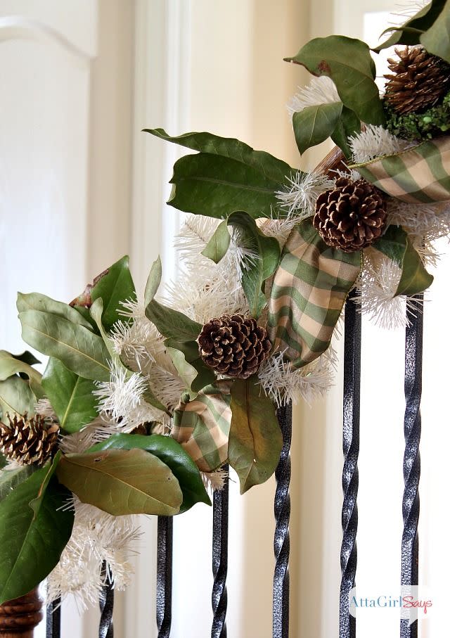 <p>Mix faux garland with real greenery, weaving in pine cones and a matching thick ribbon.</p><p>See more at <a href="http://www.attagirlsays.com/2013/12/09/handmade-christmas-garland/" rel="nofollow noopener" target="_blank" data-ylk="slk:Atta Girl Says;elm:context_link;itc:0;sec:content-canvas" class="link ">Atta Girl Says</a>. </p>