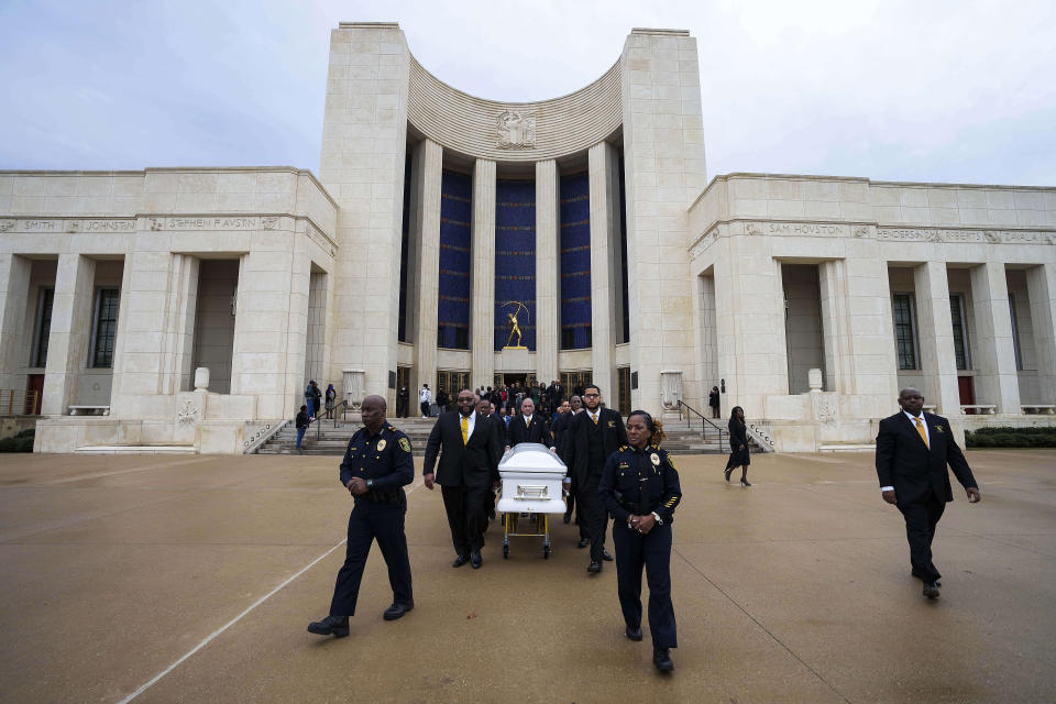 The casket of former U.S. Rep. Eddie Bernice Johnson departs the Hall of State in Fair Park after she lied in state on Monday, Jan. 8, 2024, in Dallas. Johnson, a trailblazing North Texas Democrat who served 15 terms in Congress, died at age 89 on Dec. 31. Her funeral will be held Tuesday at Concord Church in Dallas. (Smiley Pool/The Dallas Morning News via AP, Pool)