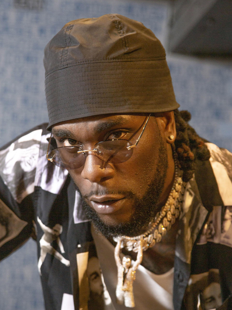 Recording artist Burna Boy poses for a portrait on Wednesday, Aug. 14, 2019, in New York. (Photo by Andy Kropa/Invision/AP)