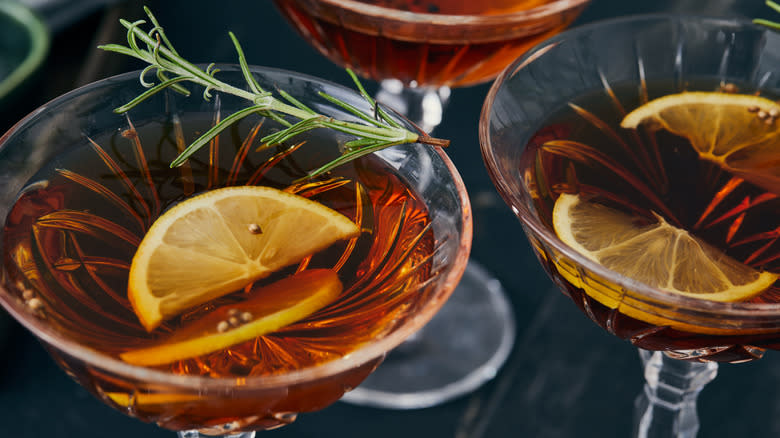 whiskey cocktail with lemon and rosemary