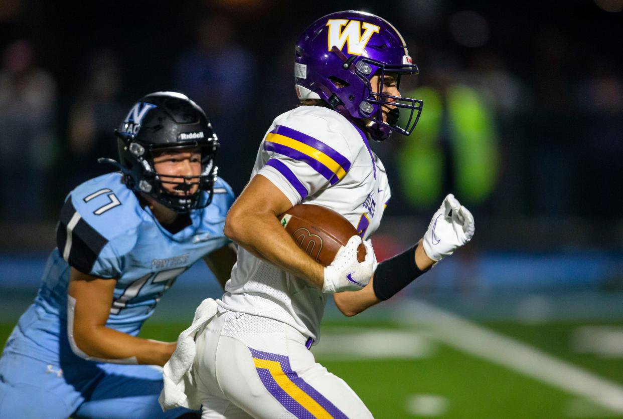 Williamsville's Ethan Hinds (7) takes off after a catch against North Mac's Kaden Brown (17) for a touchdown in the first half at North Mac High School in Virden, Ill., Friday, October 1, 2021. [Justin L. Fowler/The State Journal-Register] 