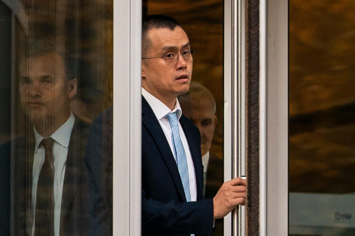 <span>Changpeng Zhao leaves court in Seattle, Washington, on 21 November 2023.</span><span>Photograph: David Ryder/Getty Images</span>