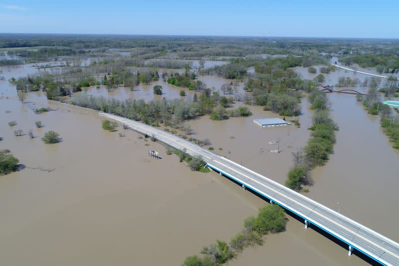 Rising flood waters of the Tittabawassee River advance upon the city after the breach of two dams in Midland