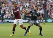 Britain Football Soccer - West Ham United v Southampton - Premier League - London Stadium - 25/9/16 Southampton's Nathan Redmond in action with West Ham United's Winston Reid Action Images via Reuters / Matthew Childs Livepic