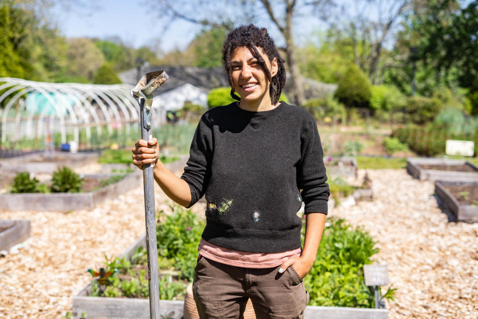 Chloe Moore, farm director, poses for a photo inside Southside Community Farm in the historically Black Asheville neighborhood of Southside on April 27, 2022.