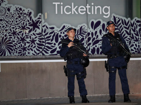 Policemen are seen at the Gardens by the Bay in Singapore, June 11, 2018. REUTERS/Kim Kyung-Hoon