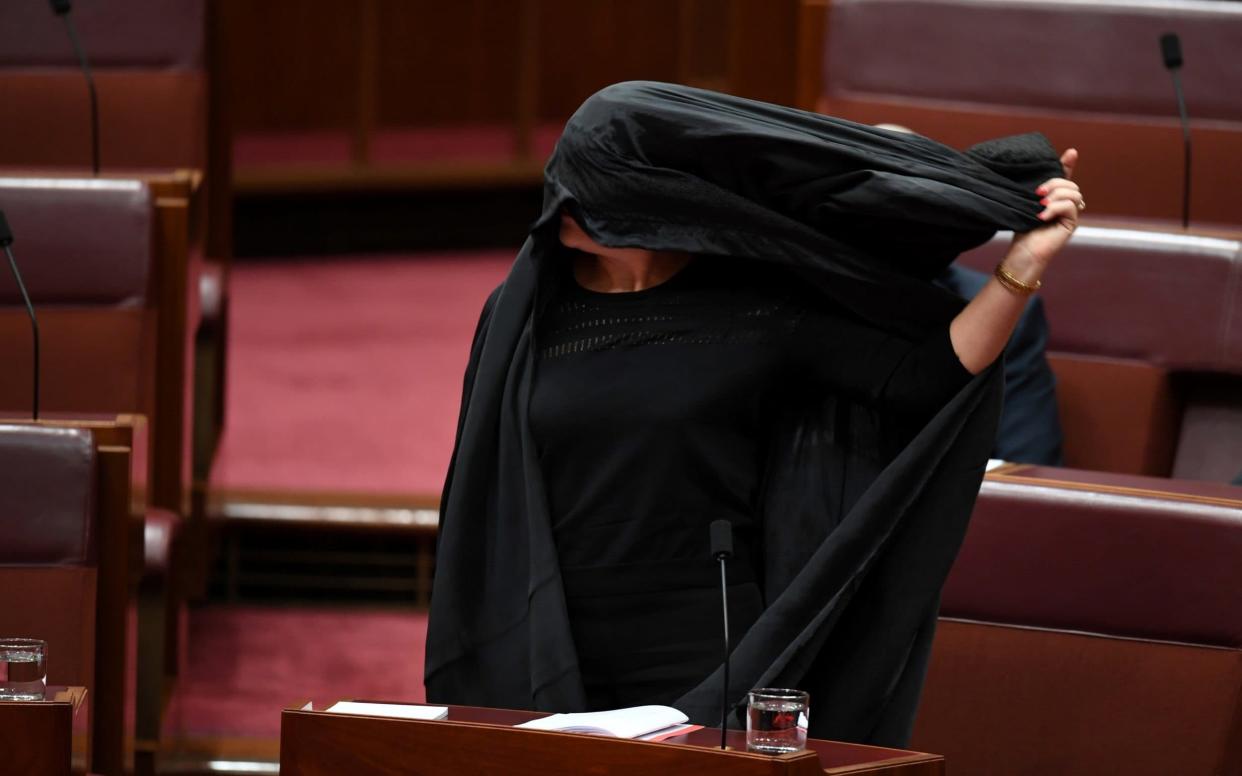 Pauline Hanson wore a burka in Australian parliament  - REUTERS