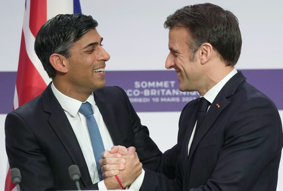 Friends united: Mr Sunak and France's President Emmanuel Macron shake hands during a joint press conference at Elysee Palace (PA)