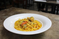 Foodies will be satisfied by the Linguine ($26) tossed in a light Saffron sauce that is topped with cherry tomatoes, basil and rosemary chicken. (Photo: Yahoo Singapore)