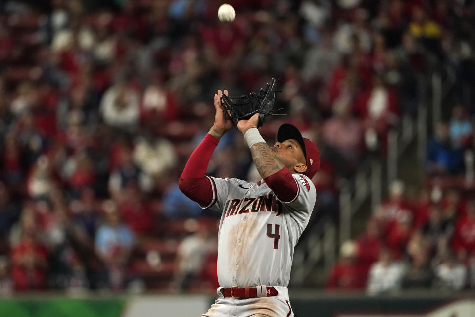 Arizona Diamondbacks second baseman Ketel Marte catches a popup by St. Louis Cardinals' Nolan Arenado for an out during the fourth inning of a baseball game Friday, April 29, 2022, in St. Louis. (AP Photo/Jeff Roberson)