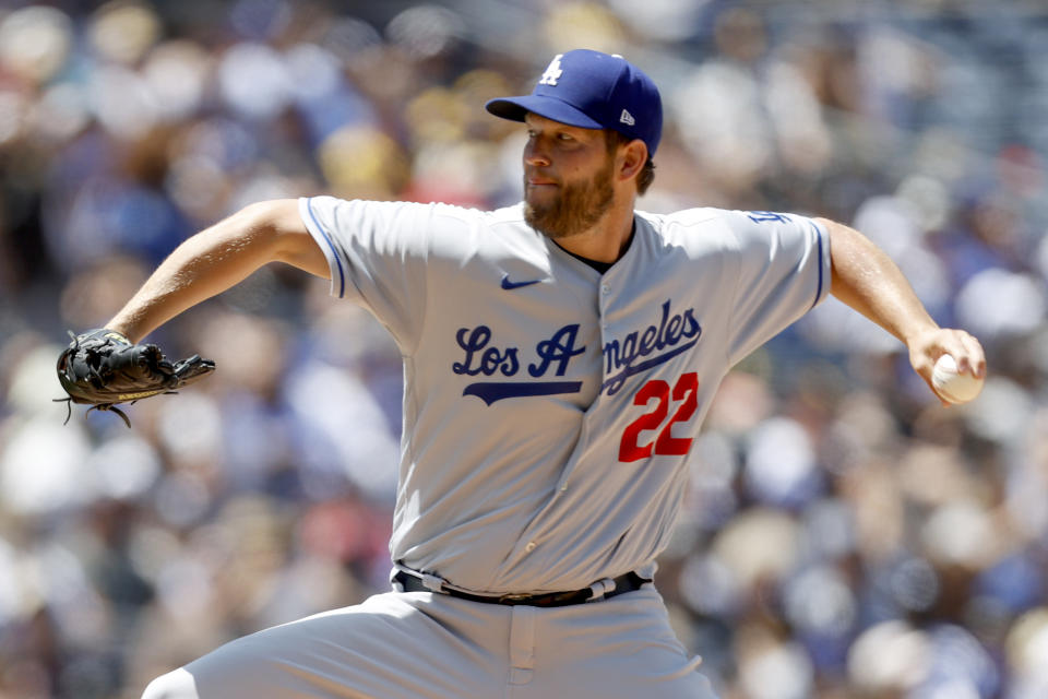 Los Angeles Dodgers' Clayton Kershaw pitches against the San Diego Padres during the first inning of a baseball game Sunday, April 24, 2022, in San Diego. (AP Photo/Mike McGinnis)