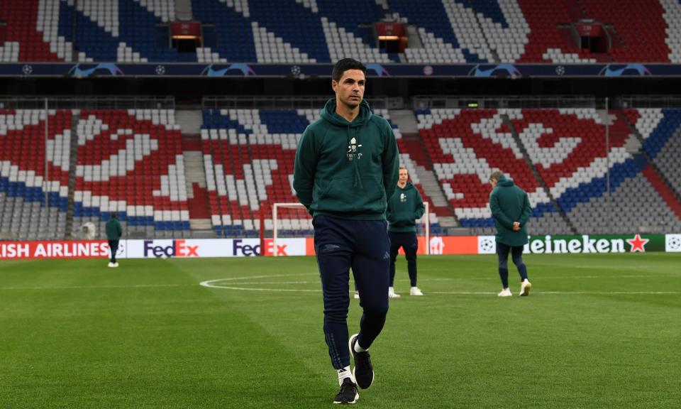 <span>Mikel Arteta takes a walk on the Allianz Arena pitch, where <a class="link " href="https://sports.yahoo.com/soccer/teams/arsenal/" data-i13n="sec:content-canvas;subsec:anchor_text;elm:context_link" data-ylk="slk:Arsenal;sec:content-canvas;subsec:anchor_text;elm:context_link;itc:0">Arsenal</a> will try to reach the last four of the Champions League on Wednesday night.</span><span>Photograph: David Price/Arsenal FC/Getty Images</span>