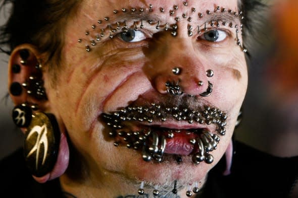 world's most pierced man stopped from entering Dubai