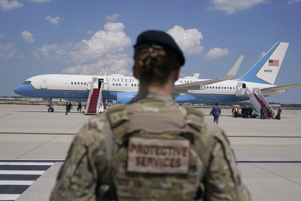 FILE - In this June 6, 2021, file photo a member of the Air Force stands guard near Air Force Two at Andrews Air Force Base, Md. About a third of the female service members in the Air Force and Space Force say they've experienced sexual harassment and many can describe accounts of sexism and a negative stigma associated with pregnancy and maternity leave, a study released Thursday, Sept. 9, has found. The review, done by the Air Force Inspector General, also concluded that minorities and females are underrepresented in leadership and officer positions, particularly at the senior levels, and get promoted less frequently. (AP Photo/Jacquelyn Martin, File)