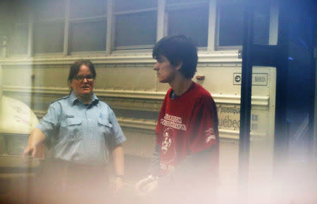 Alexandre Bissonnette, a suspect in a shooting at a Quebec City mosque, arrives at the court house in Quebec City, Quebec, Canada February 21, 2017. REUTERS/Mathieu Belanger