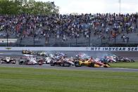 Alex Palou, (10) of Spain, leads the field at the start of the IndyCar Grand Prix auto race at Indianapolis Motor Speedway, Saturday, May 11, 2024, in Indianapolis. (AP Photo/Darron Cummings)