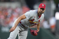 St. Louis Cardinals starting pitcher Adam Wainwright follows through on a pitch to the Baltimore Orioles in the first inning of a baseball game, Tuesday, Sept. 12, 2023 in Baltimore. (AP Photo/Julio Cortez)