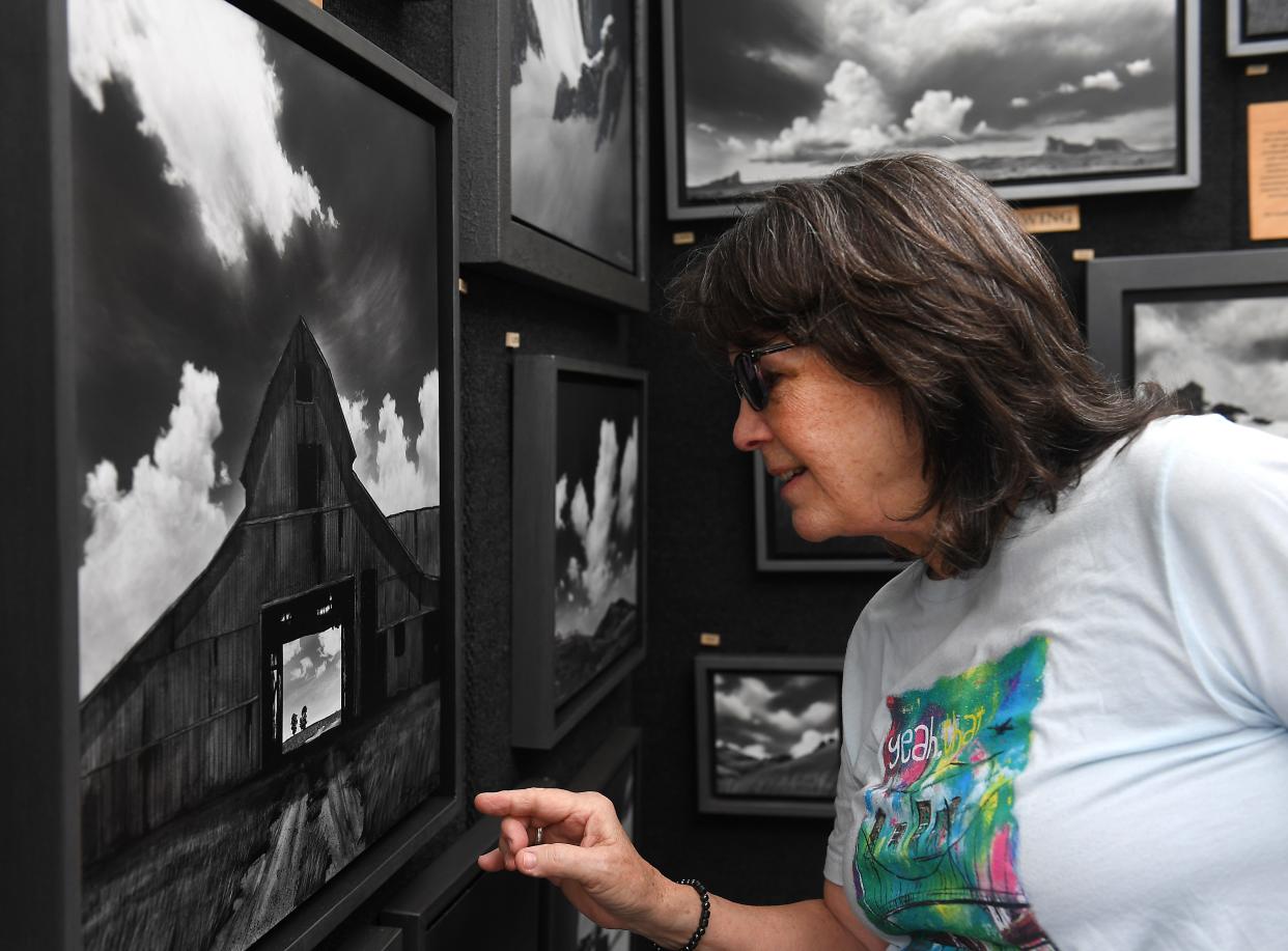 Artisphere 2023 in downtown Greenville showcased music and artists in the city's downtown area. This is Artisphere on May 13, 2023. Mary Alice Godfrey of Greer reacts to art at Artisphere 2023.