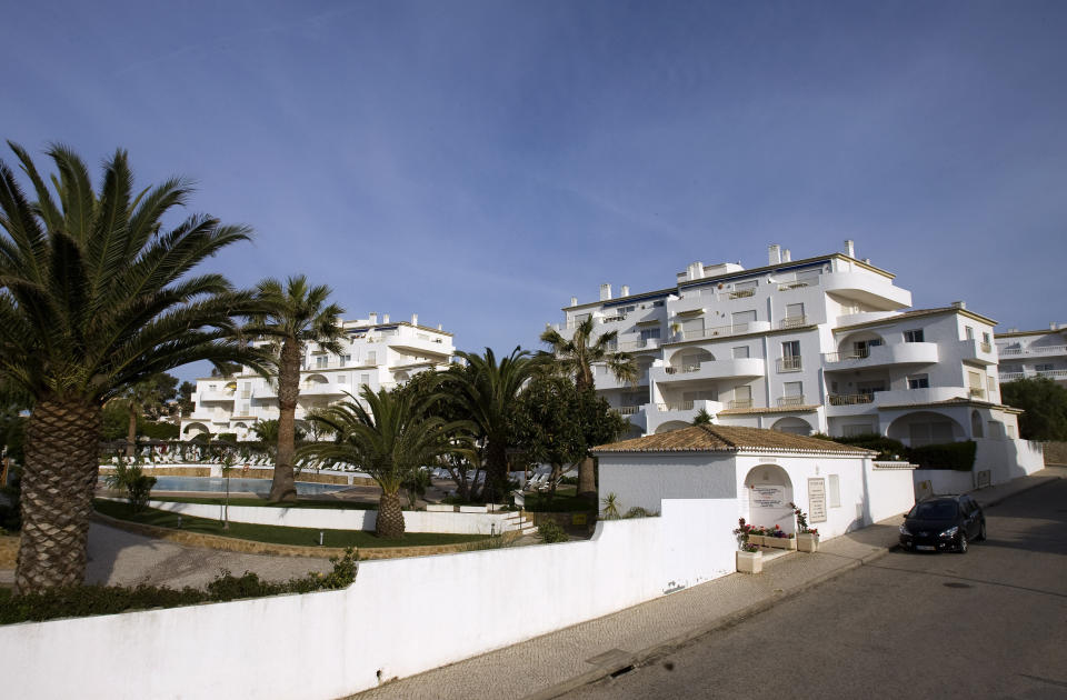 FILE - General view of the resort and apartment, first floor on the right, where British girl Madeleine McCann disappeared one year ago from their holiday hotel, Friday May 2, 2008, at Praia da Luz beach, Lagos, Portugal. A man who is also a suspect in the disappearance of British toddler Madeleine McCann goes on trial Friday, Feb. 16, 2024 over several sexual offenses he is alleged to have committed in Portugal between 2000 and 2017. (AP Photo/Paulo Duarte, File)