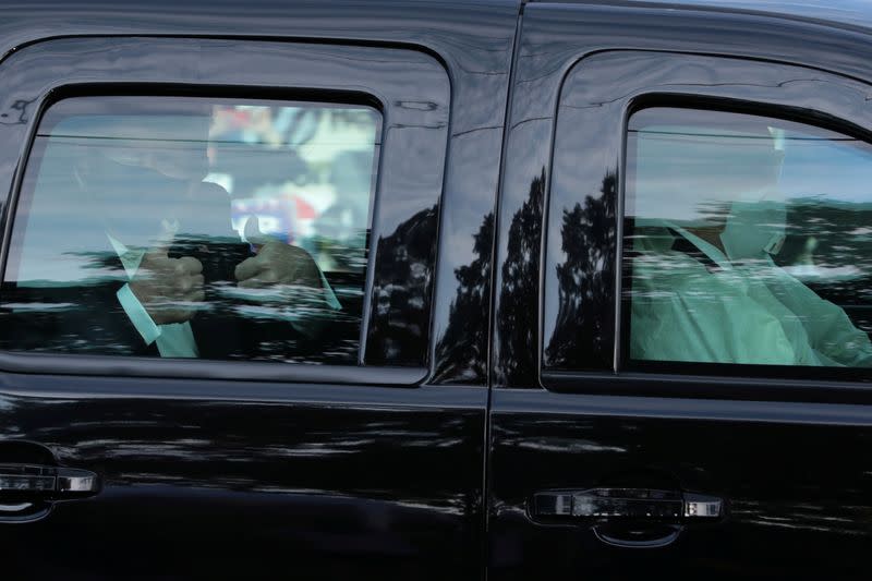 Supporters rally in support of U.S. President Donald Trump outside of the Walter Reed National Military Medical Center