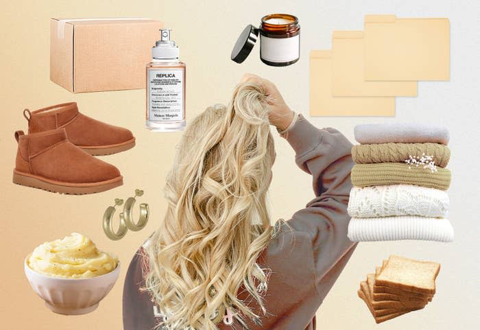 The back of a woman's head and clean, cozy, pale objects including folded sweaters, bread, earrings, perfume, and candles